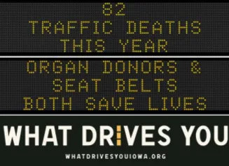 Traffic roadside graphic with text of the news article title.