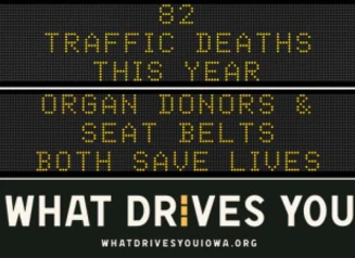 Traffic roadside graphic with text of the news article title.