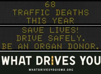 Traffic roadside graphic with text of the news article title.