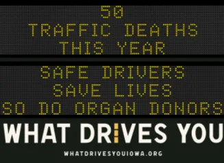 Traffic roadside graphic with text of the news article title.