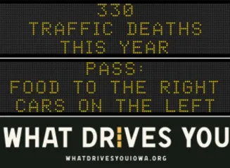 Traffic roadside graphic with text of the news article title.