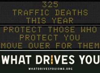 Traffic roadside graphic with text of the news article title.