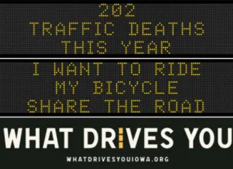 Traffic roadside graphic with text of the news article title.