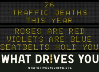 Traffic roadside graphic with text of the news article title.
