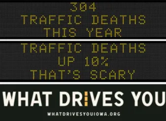 Traffic roadside graphic with text of the news article title.