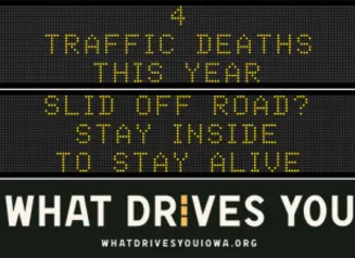 Traffic roadside graphic with text of the news article title.