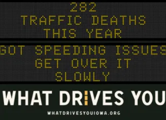 Traffic roadside graphic with text of the news article title.