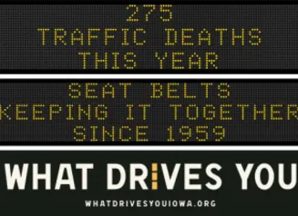 Traffic roadside graphic with text of the news article title.