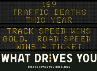 Traffic roadside graphic with text of the news article title.