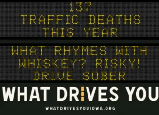 Traffic roadside graphic with text of the news article title.