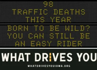 Traffic roadside graphic with text of the news article title.