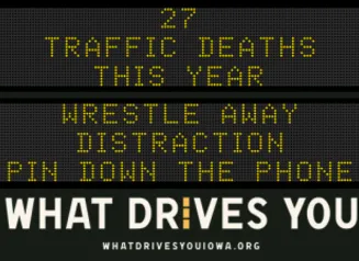 Traffic roadside graphic with text of the news article title.