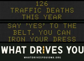 Traffic roadside graphic with text of the news article title.