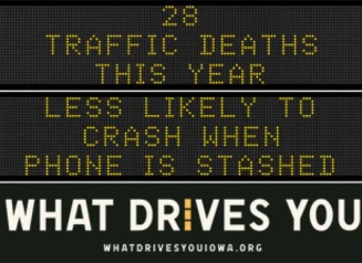Traffic roadside graphic with text of the news article title.