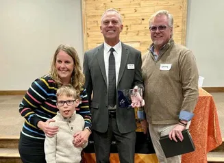 Design Bureau Director Kent Nicholson accepts award from Arc of Iowa