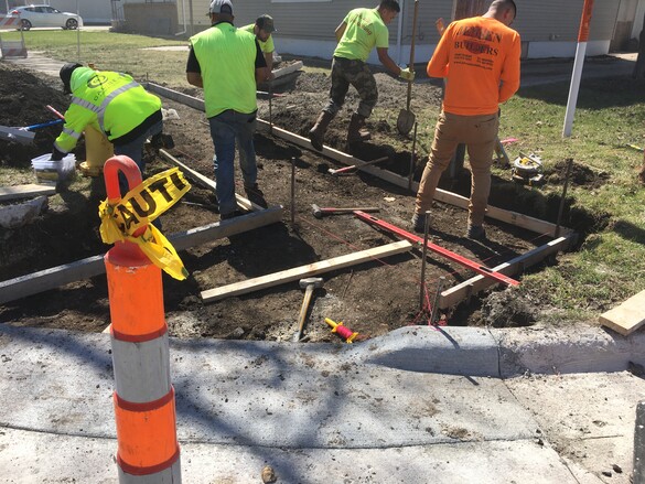 Photo of DOT crew prepping an ADA sidewalk site for concrete