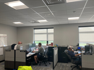 people working in office cubicles