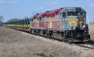 A cargo train approaching on rails