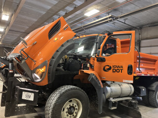 a DOT truck with the doors and hood open
