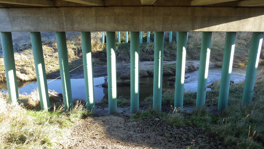 asbestos paint on bridge pillar