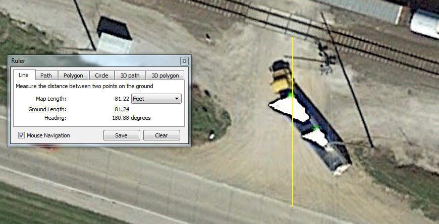 Using Google™ earth to measure distance between crossing and main road.