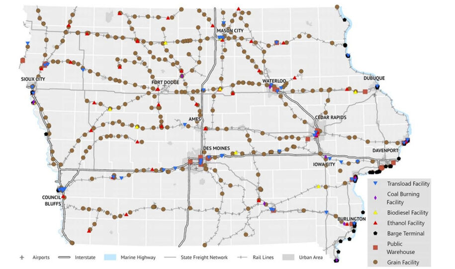Map of Iowa's freight infrastructure network showing highways, rail lines, marine highways, and key facilities including grain facilities, ethanol plants, barge terminals, public warehouses, transload facilities, coal burning facilities, and biodiesel plants across major cities including Des Moines, Cedar Rapids, Davenport, Sioux City, and Waterloo. Source: Iowa DOT, Leonard's Guide, Rail companies, and U.S. Army Corps of Engineers.
