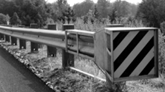 SKT energy‑absorbing terminal at the end of a guardrail.