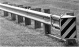 FLEAT energy‑absorbing terminal at the end of a guardrail.
