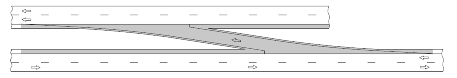 Diagram of a temporary median crossover showing two separated highway lanes with opposing traffic and a paved crossover that tapers from one roadway, crosses the median, and connects to lanes in the opposite direction. Directional arrows and lane markings illustrate the traffic flow through the crossover