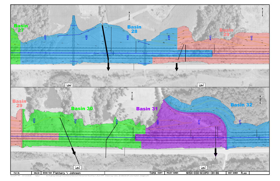 Plan sheet showing color‑coded drainage basins with contour lines and arrows indicating surface water flow across the roadway corridor.
