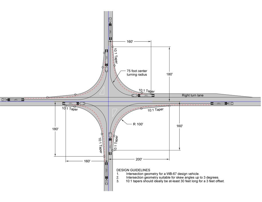 Diagram showing WB‑67 truck turning paths with 75‑ft and 100‑ft radii, 10:1 tapers, and dimensions for a divided‑highway intersection.