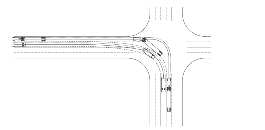 Semi‑trailer turning in the outside lane and a single‑unit vehicle in the inside lane, showing dual turning paths for side‑by‑side turns.