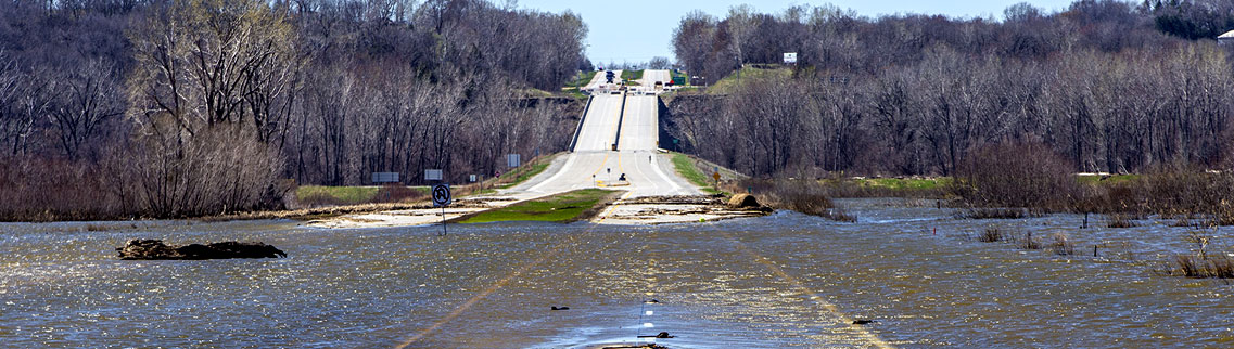 Flooded road photo in Iowa